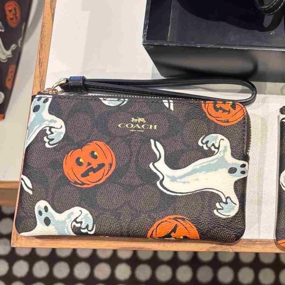 SOLD.  Coach Corner Zip Wristlet In Signature Canvas With Halloween Print